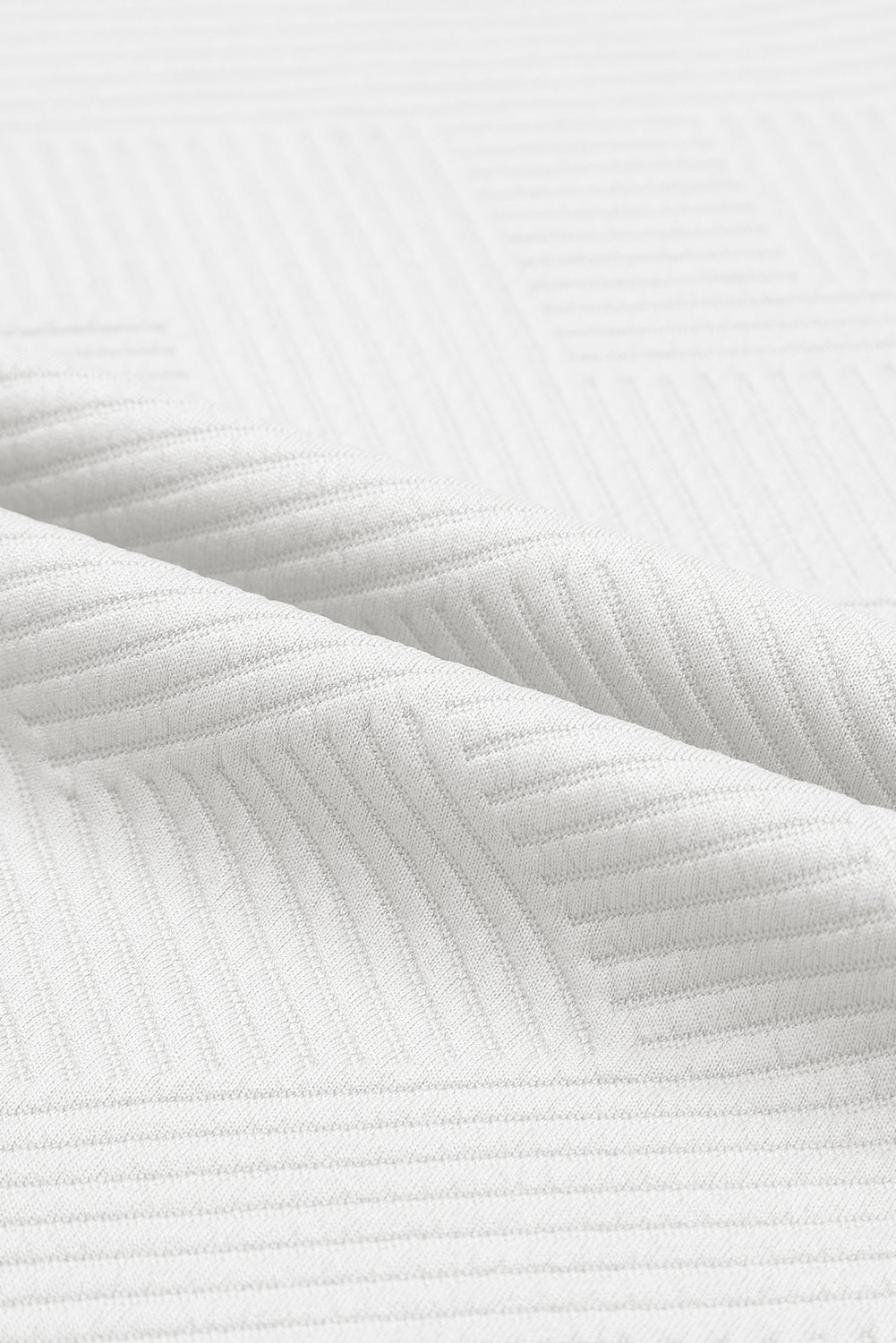Schwarzes, strukturiertes, locker sitzendes T-Shirt und Hose mit Kordelzug