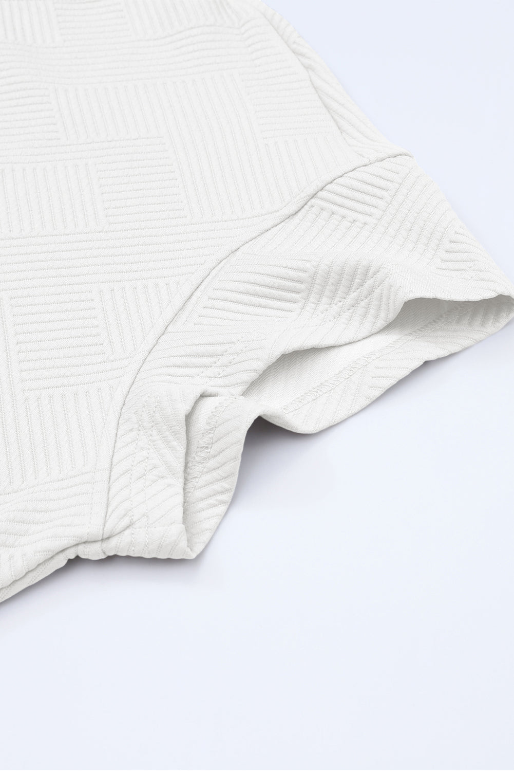 Schwarzes, strukturiertes, locker sitzendes T-Shirt und Hose mit Kordelzug