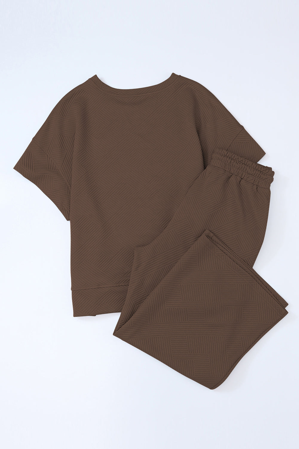 Schwarzes, strukturiertes, locker sitzendes T-Shirt und Hose mit Kordelzug