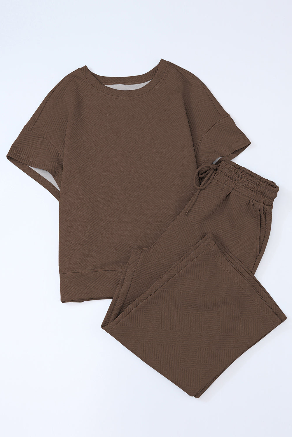 Schwarzes, strukturiertes, locker sitzendes T-Shirt und Hose mit Kordelzug